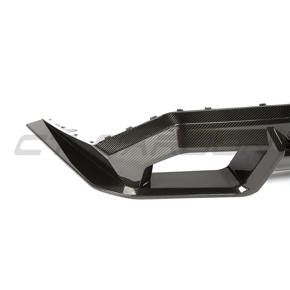BMW G90 G99 M5 2024 carbon fiber diffuser by CT Design, showcasing sleek aerodynamics and lightweight carbon fiber material.