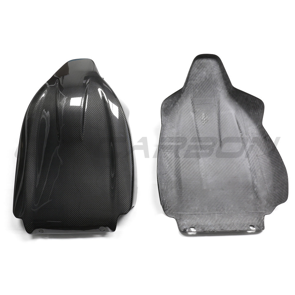 BMW GXX/F9X full carbon fiber seat backs by CT Carbon, showcasing sleek, lightweight carbon fiber material and detailed craftsmanship.