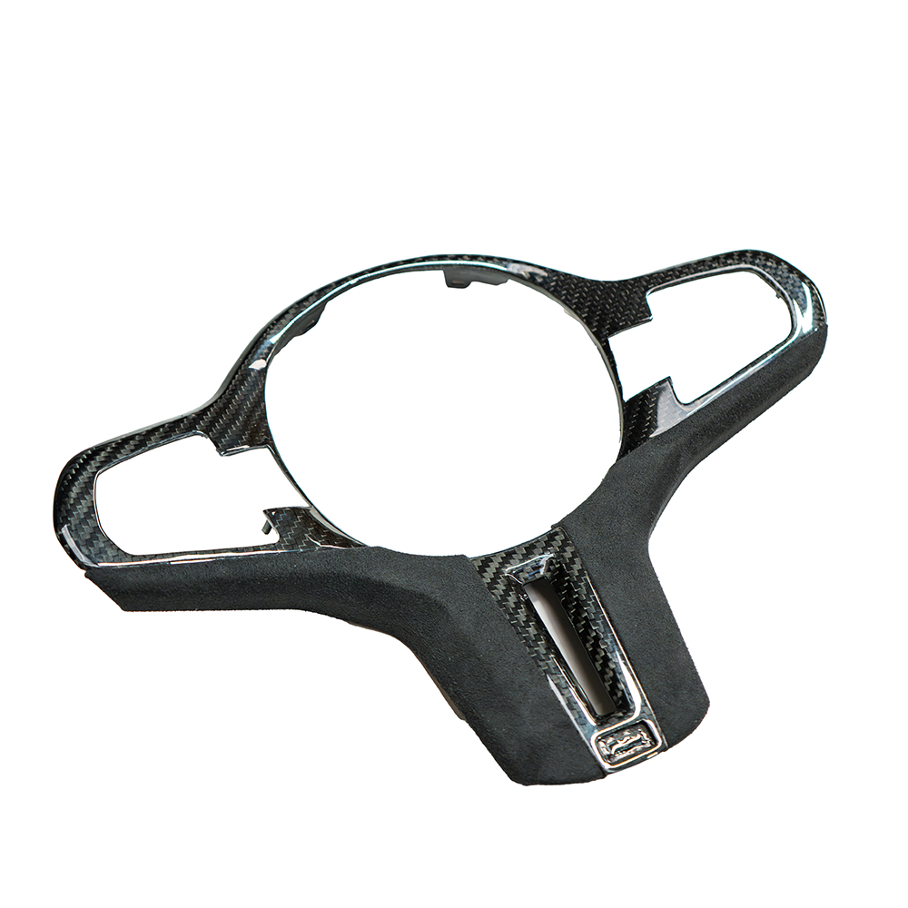 BMW Gxx M car carbon fibre steering wheel trim accessory by CT Carbon, featuring a sleek, textured finish for pre-LCI models.
