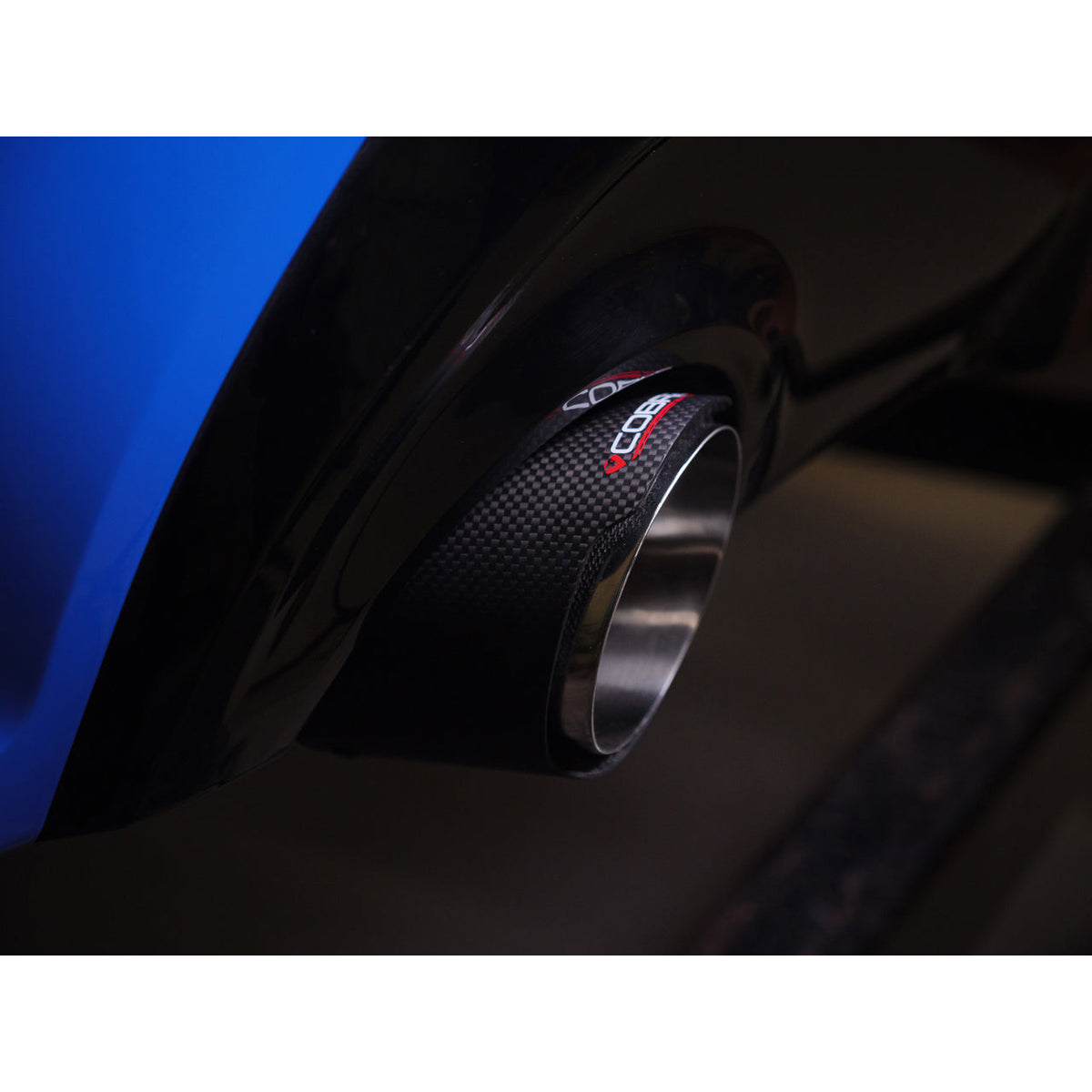 Cobra Sport BMW M135i F40 Venom Cat Back Race Box Delete Performance Exhaust installed on car with sporty exhaust tips.