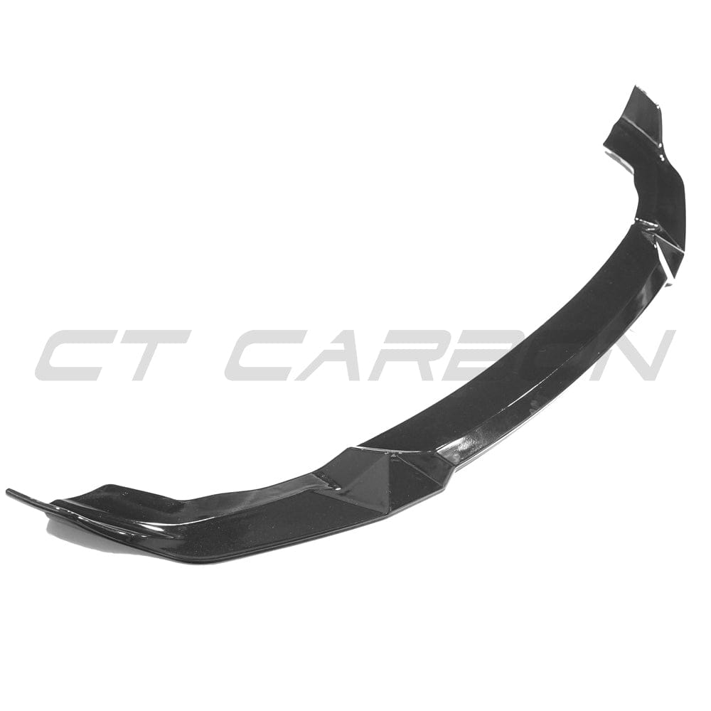 BMW M2 F87C Competition gloss black splitter by CT Carbon installed on front of the car, showcasing its sleek aerodynamic design.