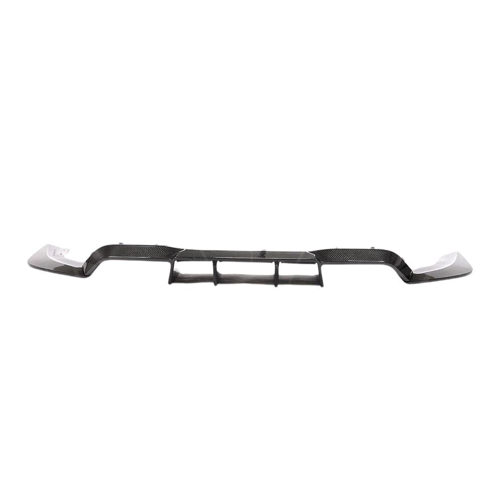 BMW M2 F87 CT Carbon fiber diffuser V3, a sleek aerodynamic car part with a carbon fiber finish for enhanced performance.