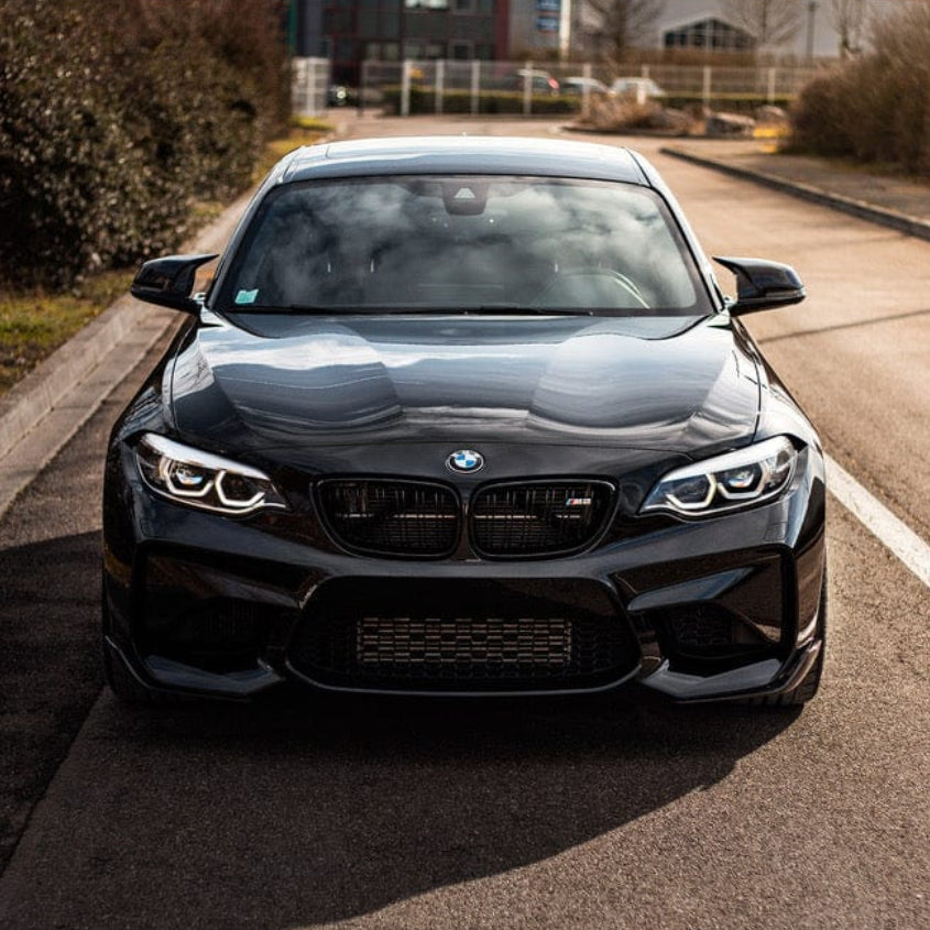 BMW M2 F87 CT Carbon full carbon fiber kit including body panels and accents, showcasing a sleek, high-performance upgrade.