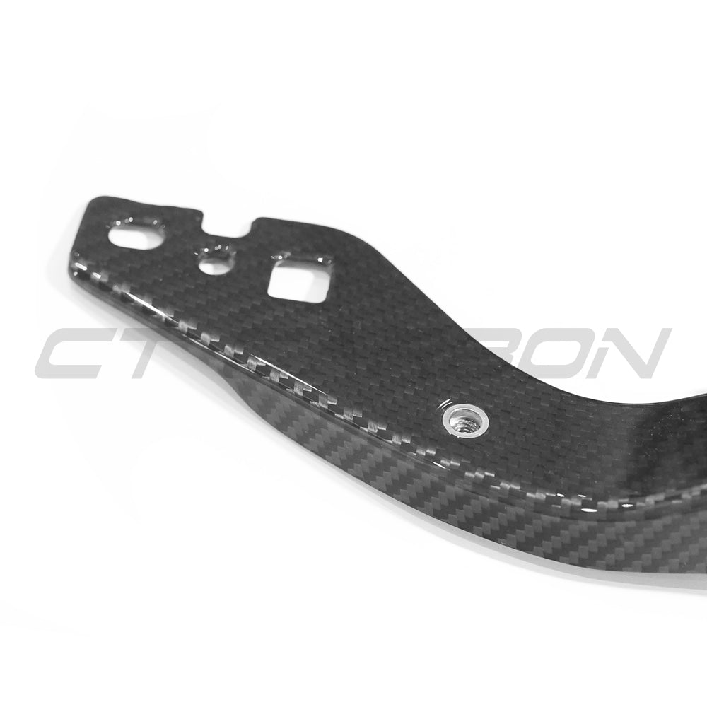 BMW M2, M3, M4 G87, G80, G81, G82, G83 carbon fiber slam panel replacement by CT Carbon, showing sleek textured surface.