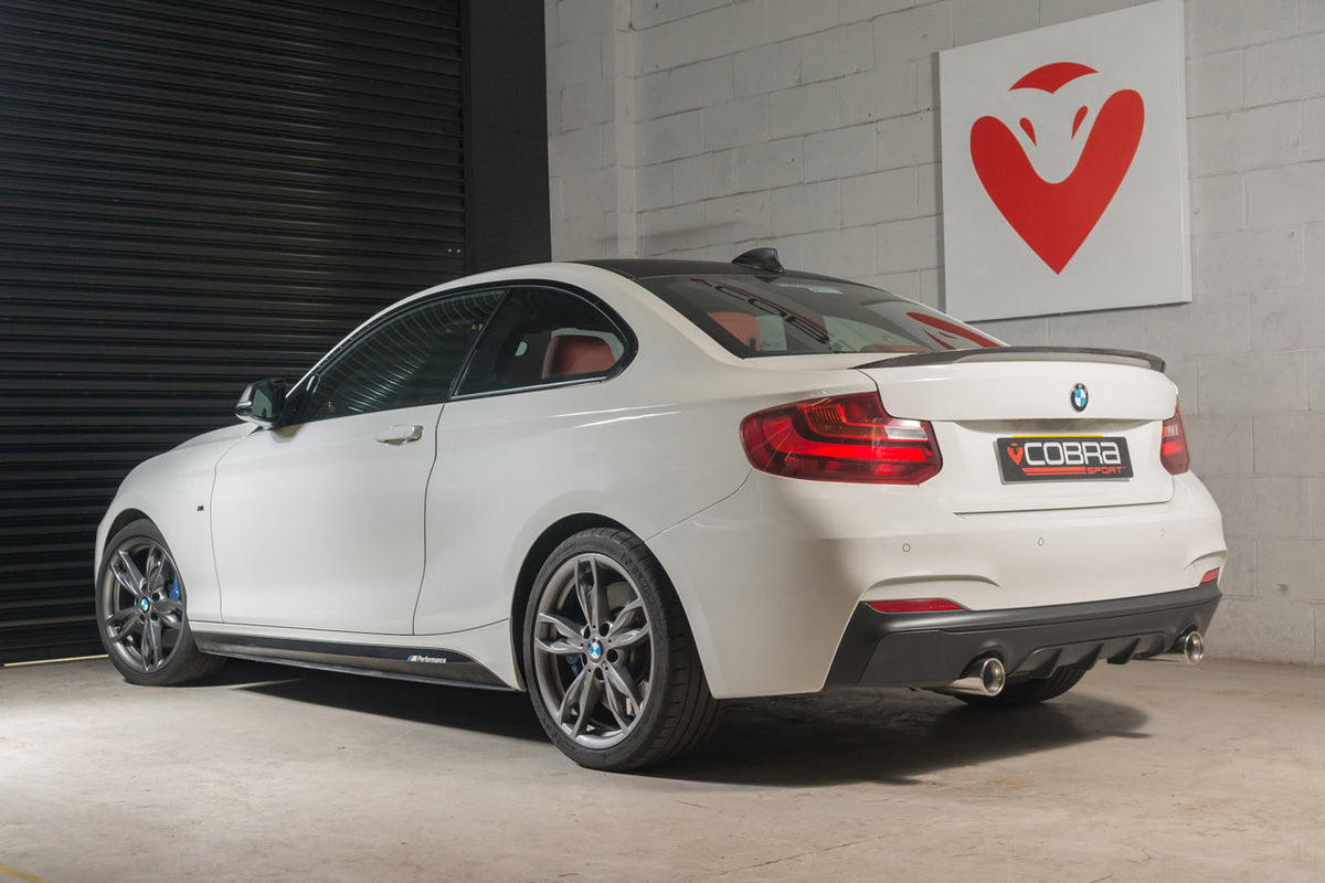 Cobra Sport BMW M240i rear axle back exhaust with polished stainless steel tips and performance muffler for F22/F23 models.