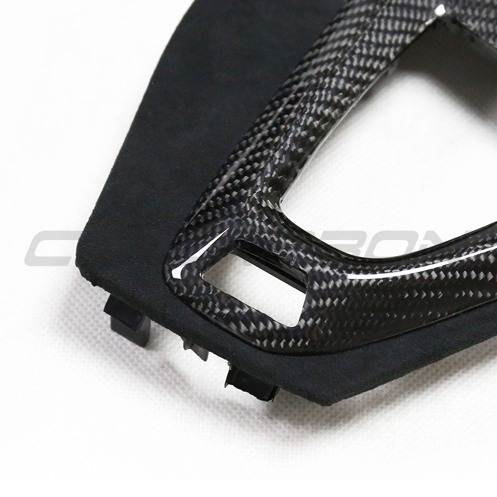 BMW M2C F87 accessories: CT Carbon Alcantara and carbon fiber shifter surround for right-hand drive vehicle interior.