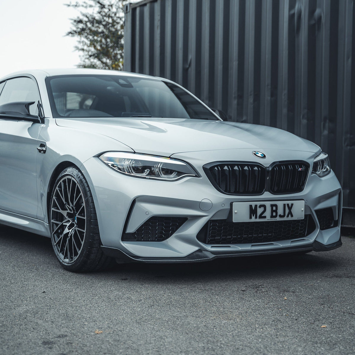 BMW M2C F87 full carbon fiber kit by CT Carbon, showcasing the sleek, lightweight carbon fiber parts on the sports car.