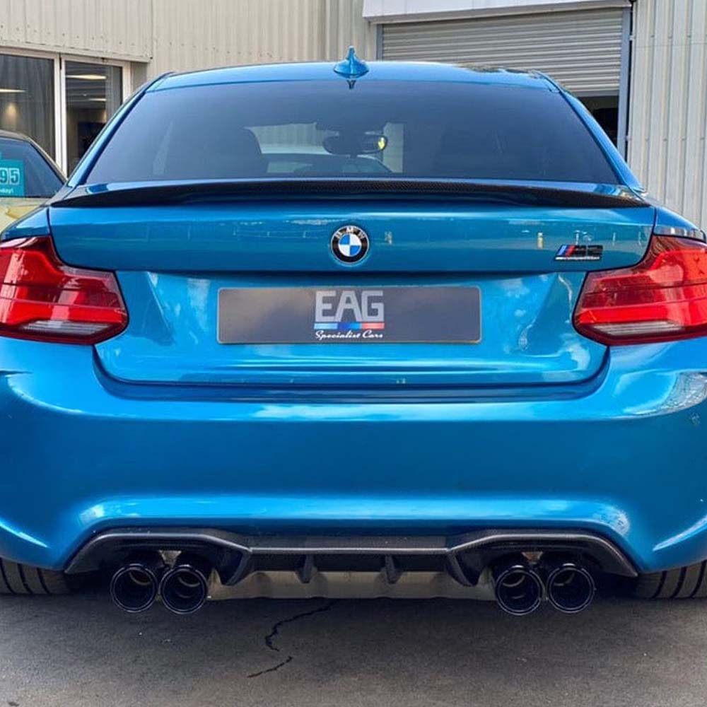 BMW M2 F87 carbon fibre diffuser by CT Carbon, featuring sleek V1 design with detailed carbon fiber weave and aerodynamic styling.