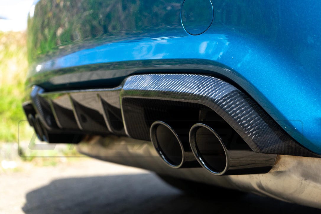 BMW M2 F87 carbon fibre diffuser by CT Carbon, V2 style, showcasing sleek lightweight design and aerodynamic features.