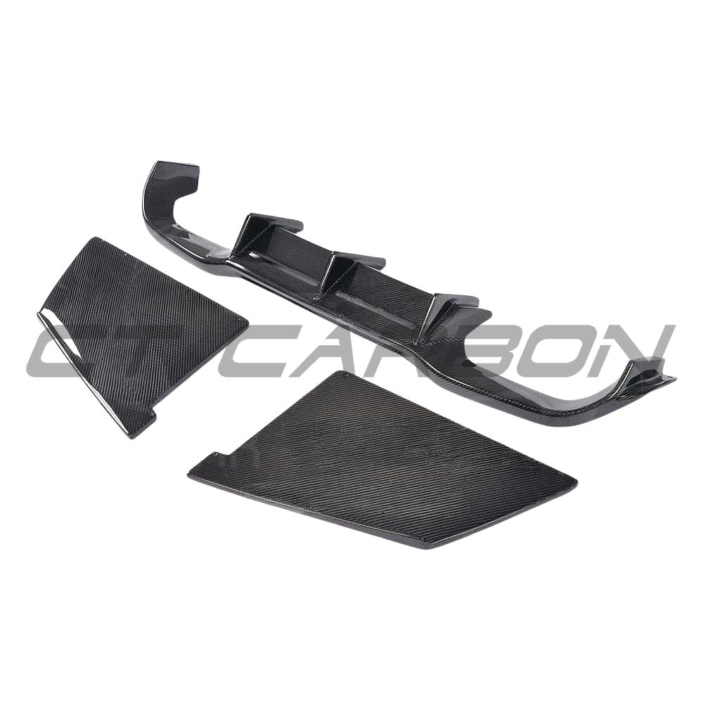 BMW M2 F87 carbon fibre diffuser by CT Carbon, V4 model, showcasing sleek aerodynamic design and high-quality craftsmanship.