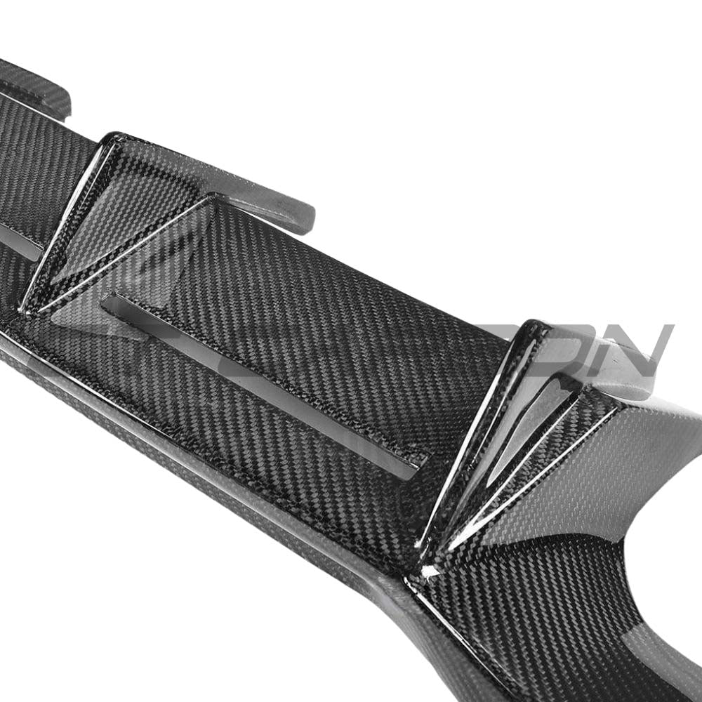 BMW M2 F87 carbon fiber diffuser by CT Carbon, V4 version, with aerodynamic design shown on the car's rear underside.
