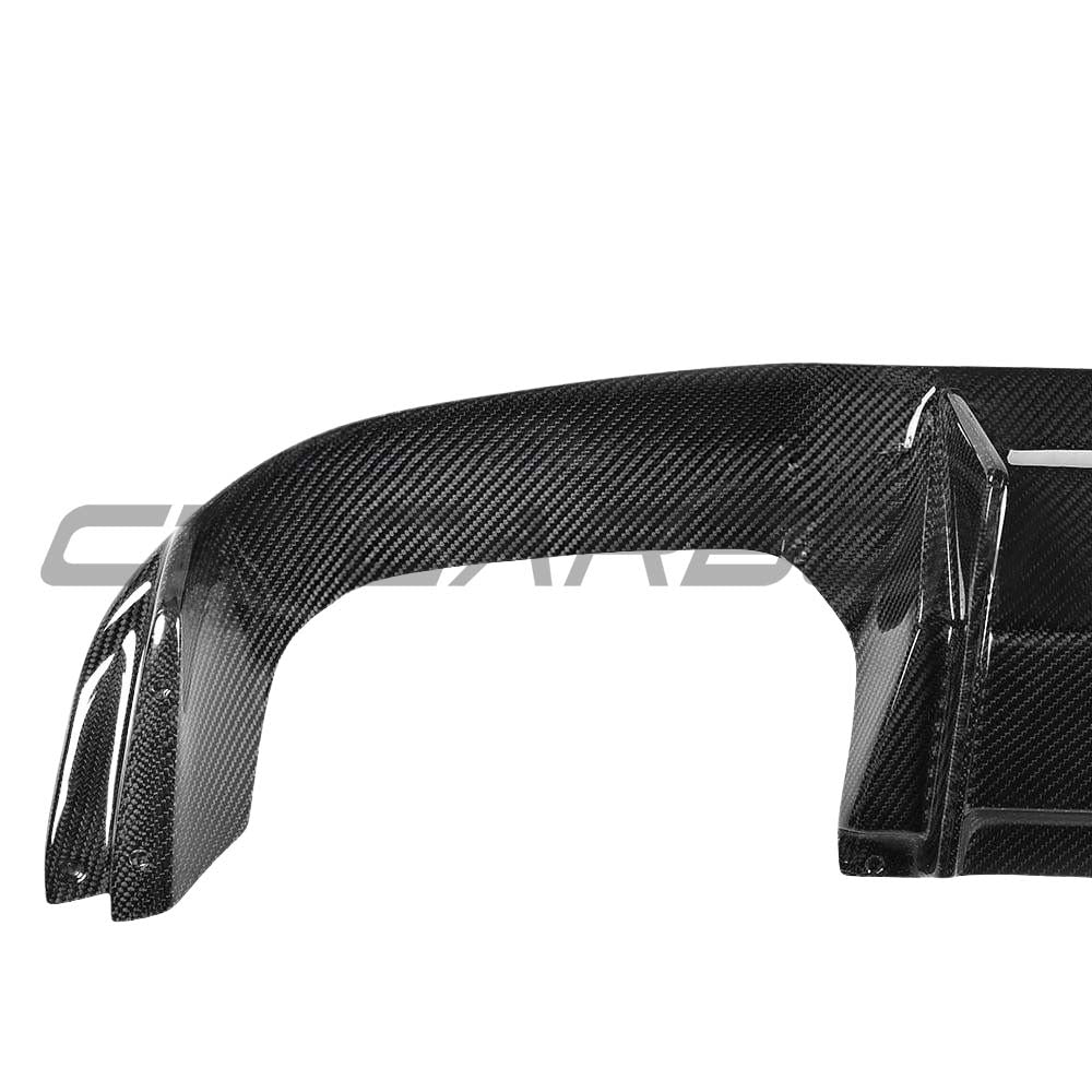 BMW M2/M2C F87 carbon fiber diffuser by CT Carbon, featuring sleek V4 design with textured carbon fiber finish.