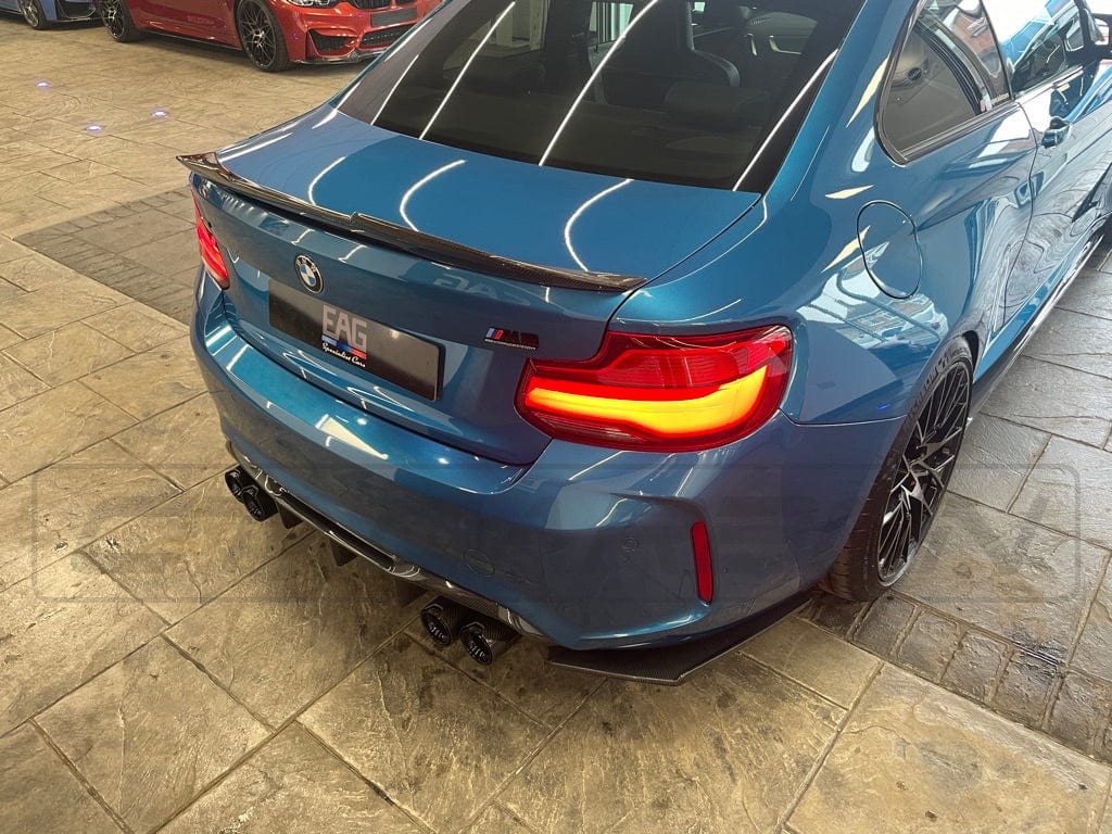 BMW M2 F87 carbon fiber diffuser by CT Carbon, V4 style, showcasing sleek, lightweight aerodynamic design for M2 and M2C models.