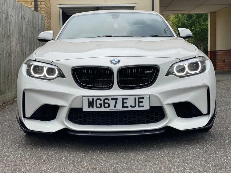 BMW M2 F87 carbon fiber middle splitter by CT Carbon, V5 style, designed for aerodynamic enhancement and sporty look.