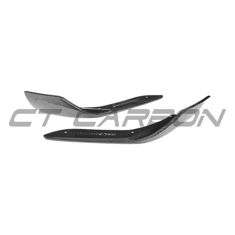 BMW M2/M2C F87 carbon fibre splitter by CT Carbon, V1, showing sleek, lightweight aerodynamic design on a sporty car.
