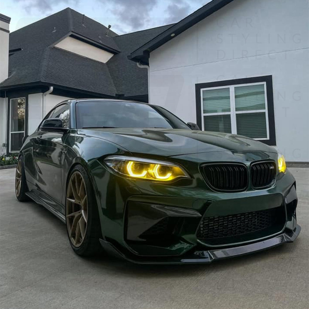 BMW M2 F87 M2C LCI yellow adaptive DRL module set by CT Carbon, showcasing the sleek LED daytime running lights on the car's front.