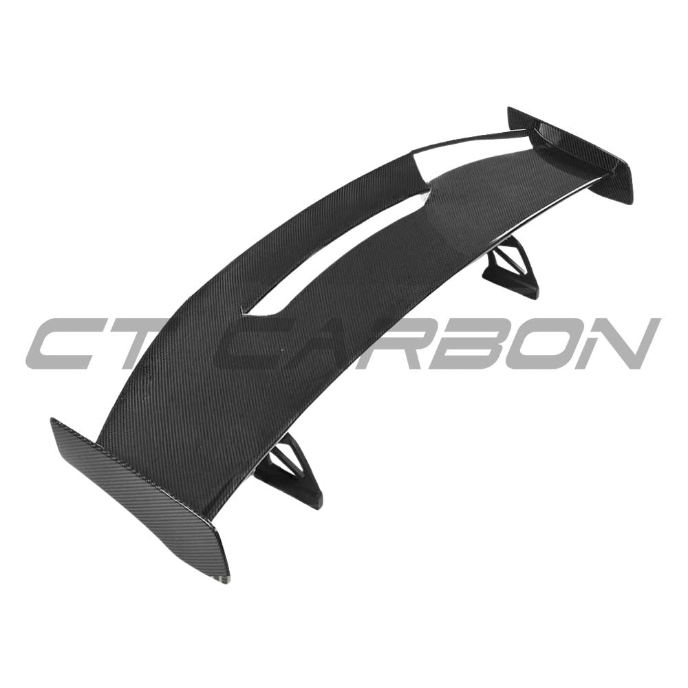 BMW M2 M3 M4 carbon fibre wing spoiler by CT Carbon, V2 style, showcasing the sleek, aerodynamic design and carbon fiber finish.