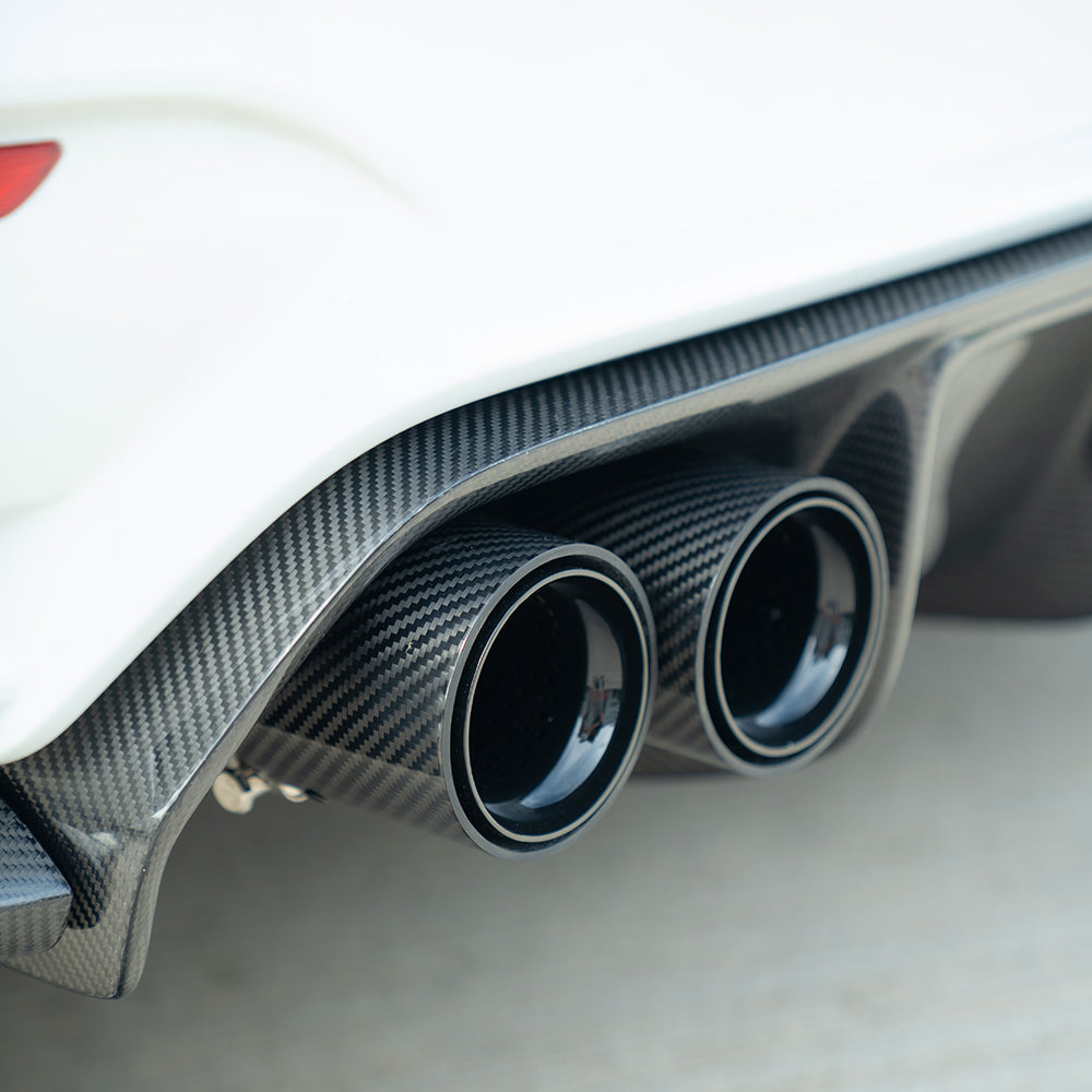 Set of four black carbon fibre exhaust tips for BMW M2, M3, M4, M5, F10, F80, F82, F83, F87 models by CT Carbon