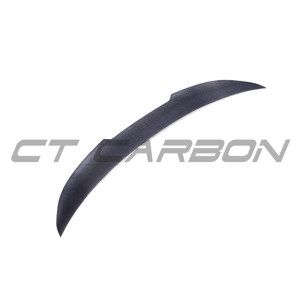 BMW M3 and 3 Series E90 carbon fiber spoiler by CT Carbon, showcasing sleek, aerodynamic design on a white sedan.