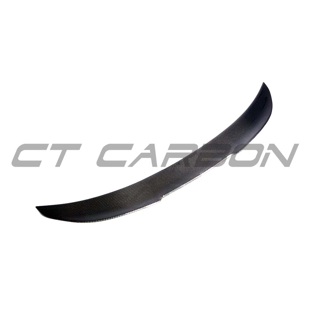 BMW M3 and 3 Series E90 carbon fibre spoiler by CT Carbon, showcasing sleek, aerodynamic design on a saloon car.