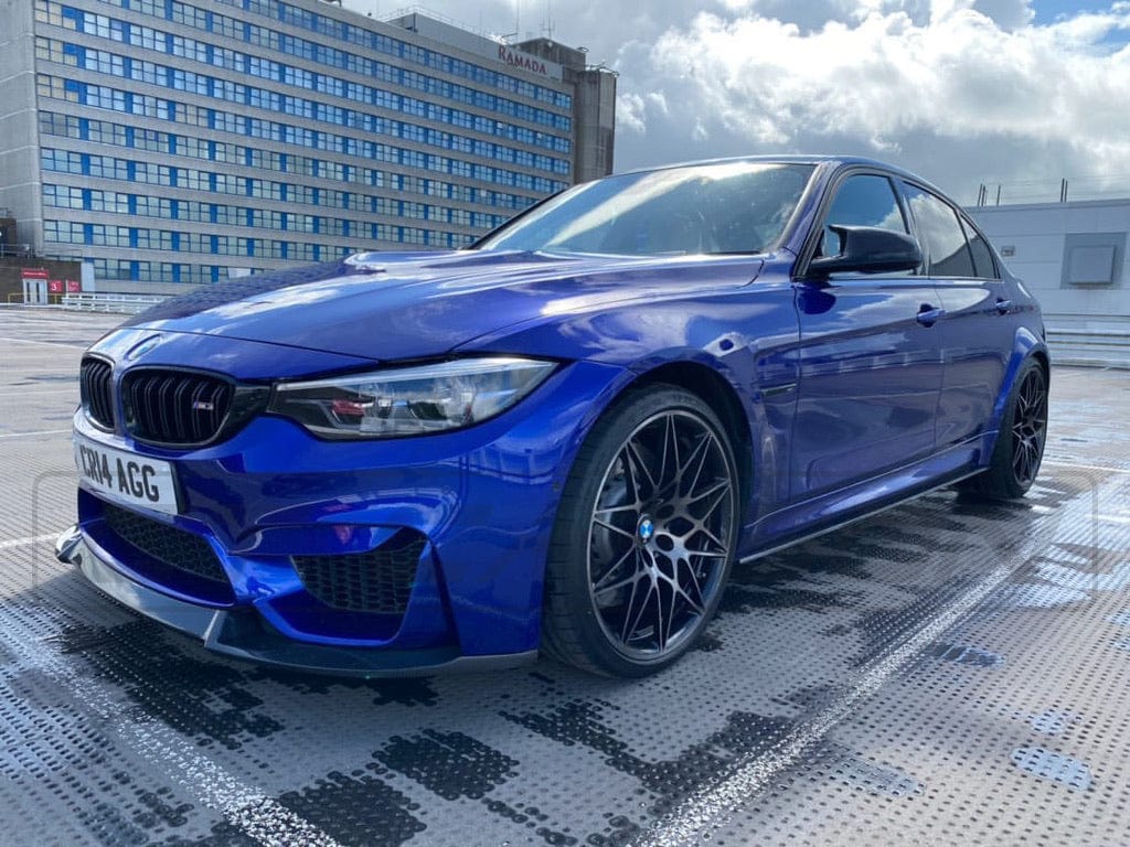 BMW M3 F80 full carbon fiber kit by CT Carbon, featuring CS style components on a sleek sports car.
