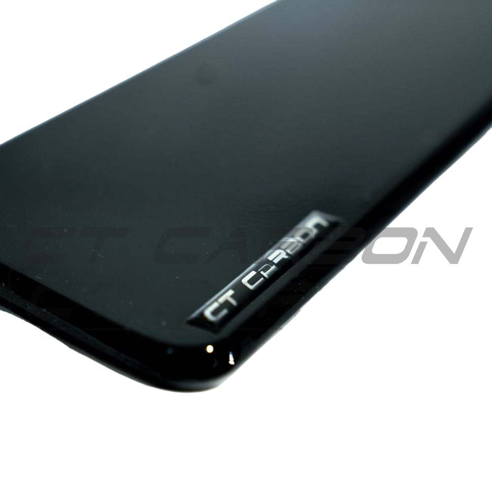 BMW M4 F83 convertible full gloss black kit by CT Carbon, showing close-up of the sleek, black carbon fiber exterior kit.