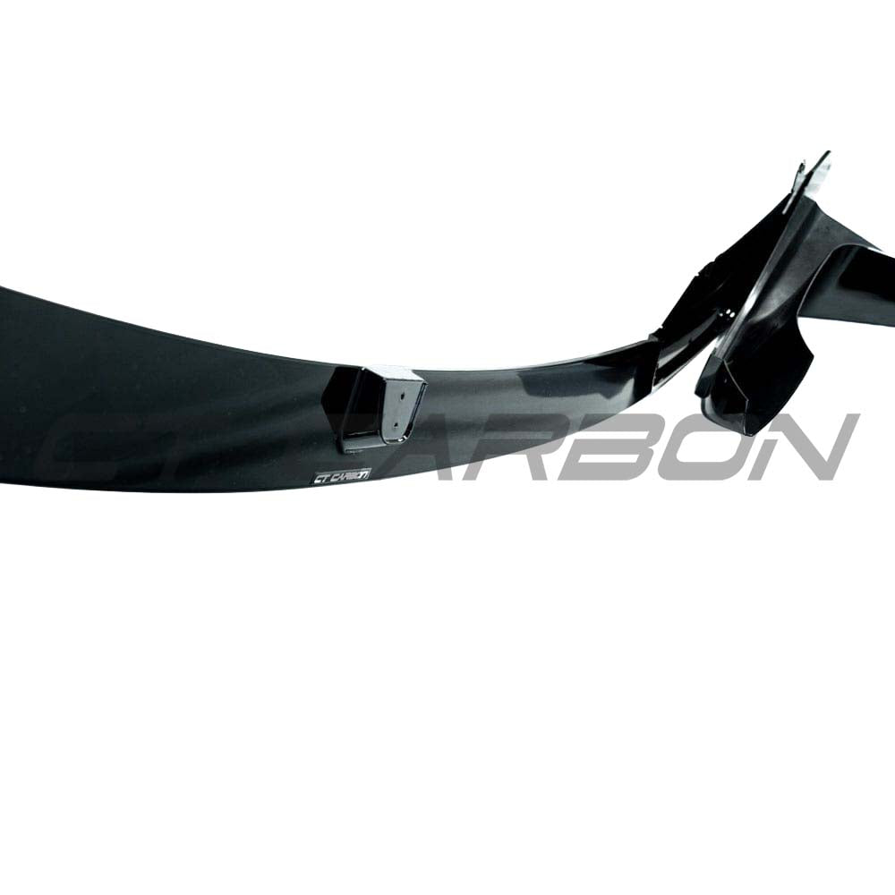 BMW M3 F80 2014-2020 CT Carbon full gloss black kit installed on car, showcasing sleek aerodynamic enhancements.