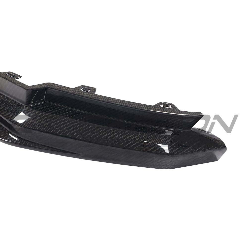 BMW M3 G80 G81 carbon fibre diffuser by CT Carbon, showing its sleek, lightweight design with detailed carbon fibre texture.