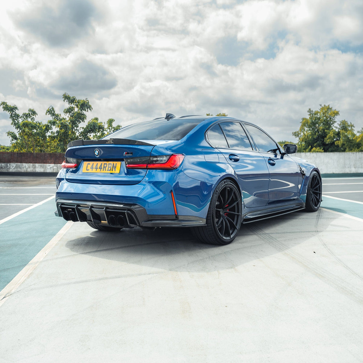 BMW M3 G80/G81 carbon fibre diffuser by CT Carbon, showcasing its sleek, lightweight design and textured finish.