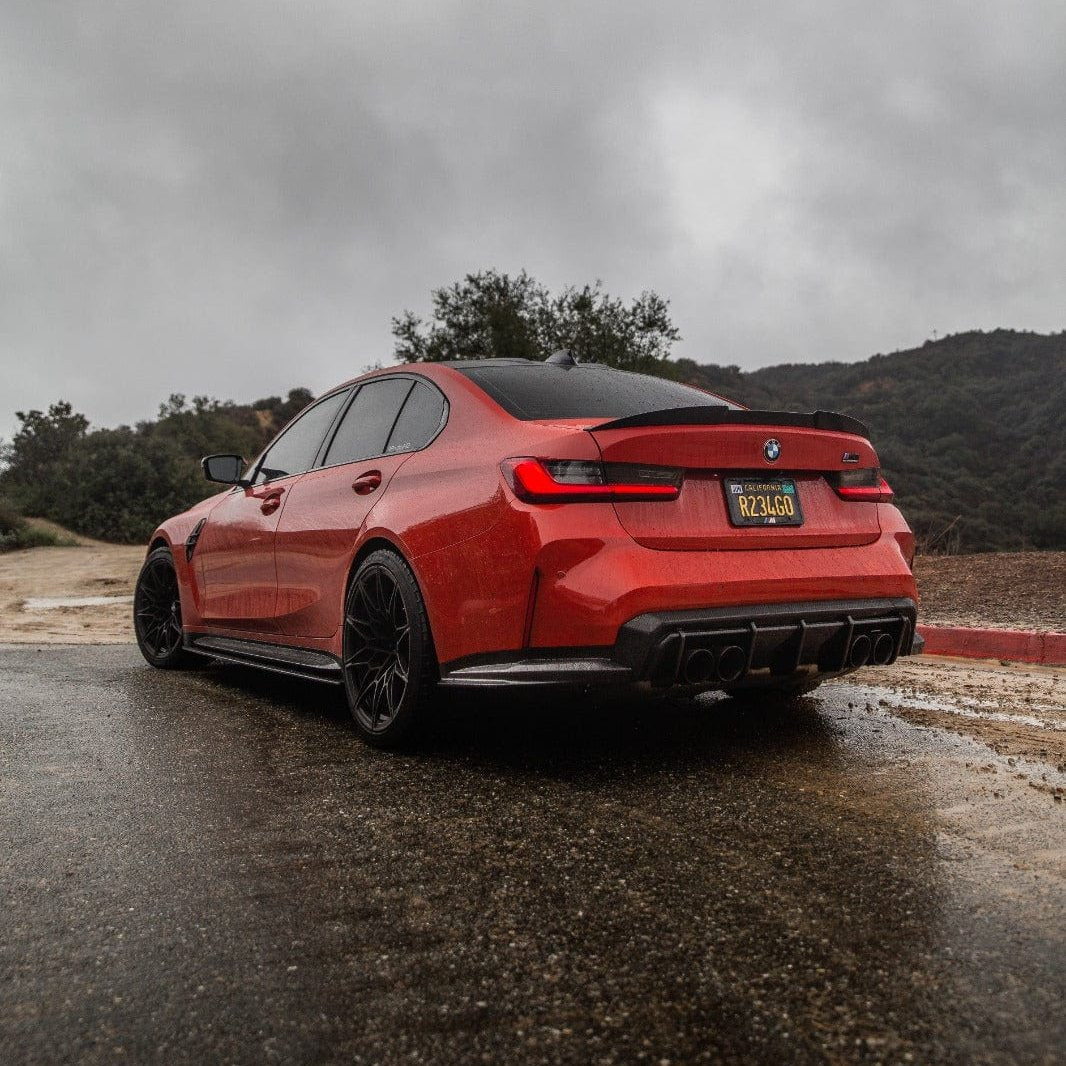 BMW M3 G80 G81 carbon fibre diffuser by CT Design, showcasing sleek, lightweight aerodynamic rear diffuser for enhanced performance.