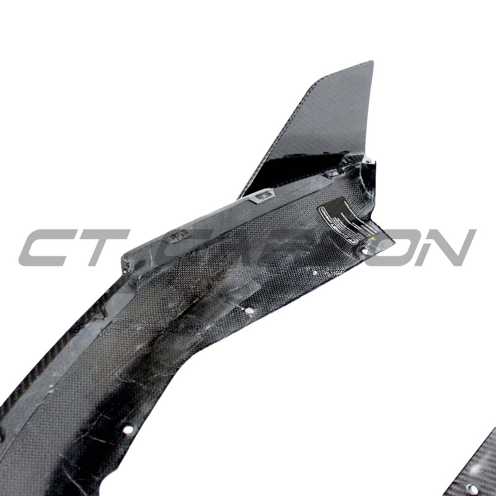 BMW G80 M3 carbon fibre rear bumper corners kit by CT Carbon, showcasing sleek, lightweight carbon fibre components with detailed finish.