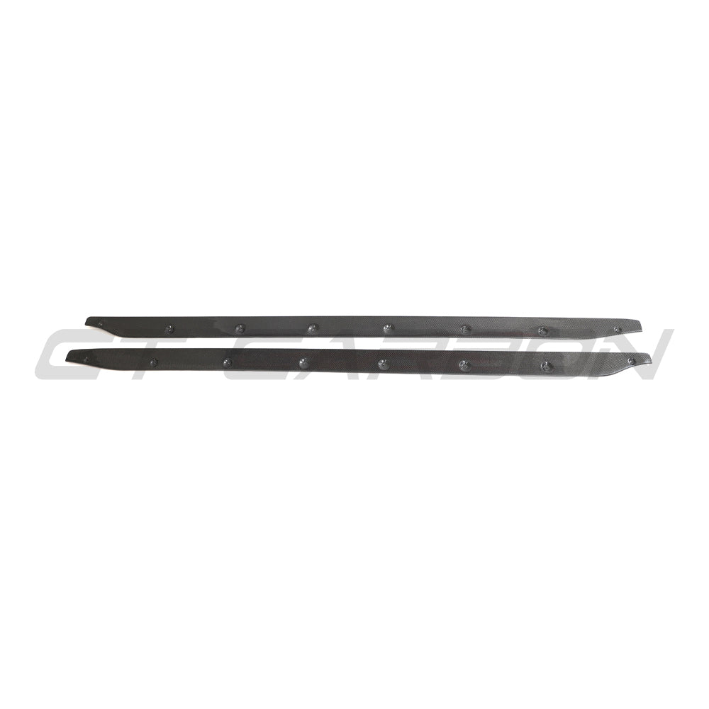 BMW M3 G80 G81 carbon fibre side skirt extensions by CT Carbon, showing sleek, textured aerodynamic side skirts on the car.