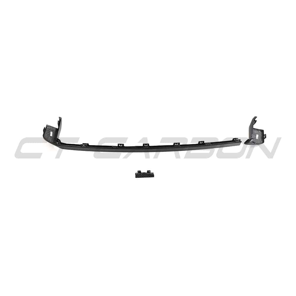 BMW M3 and M4 G80 G82 carbon fiber diffuser trim by CT Carbon, showcasing sleek black textured finish on car accessory.