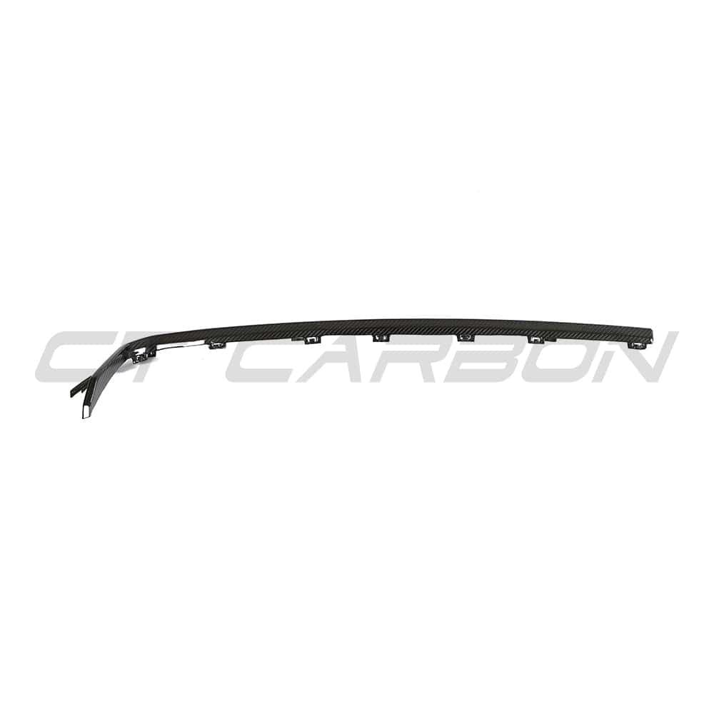 BMW M3 M4 G80 G81 G82 G83 carbon fiber diffuser trim accessory by CT Carbon, shown installed on the rear of the vehicle.