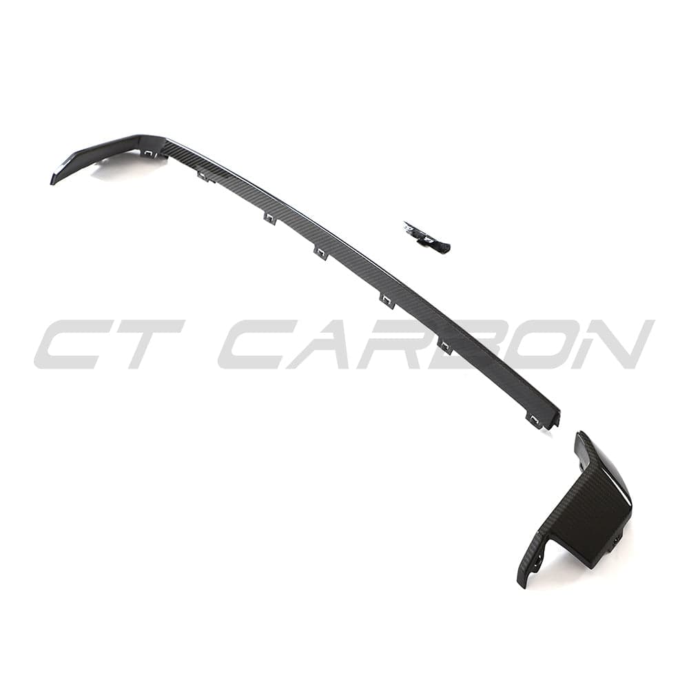BMW M3 and M4 G80 G81 G82 G83 carbon fiber diffuser trim accessory by CT Carbon, showcasing sleek, lightweight design on the car.