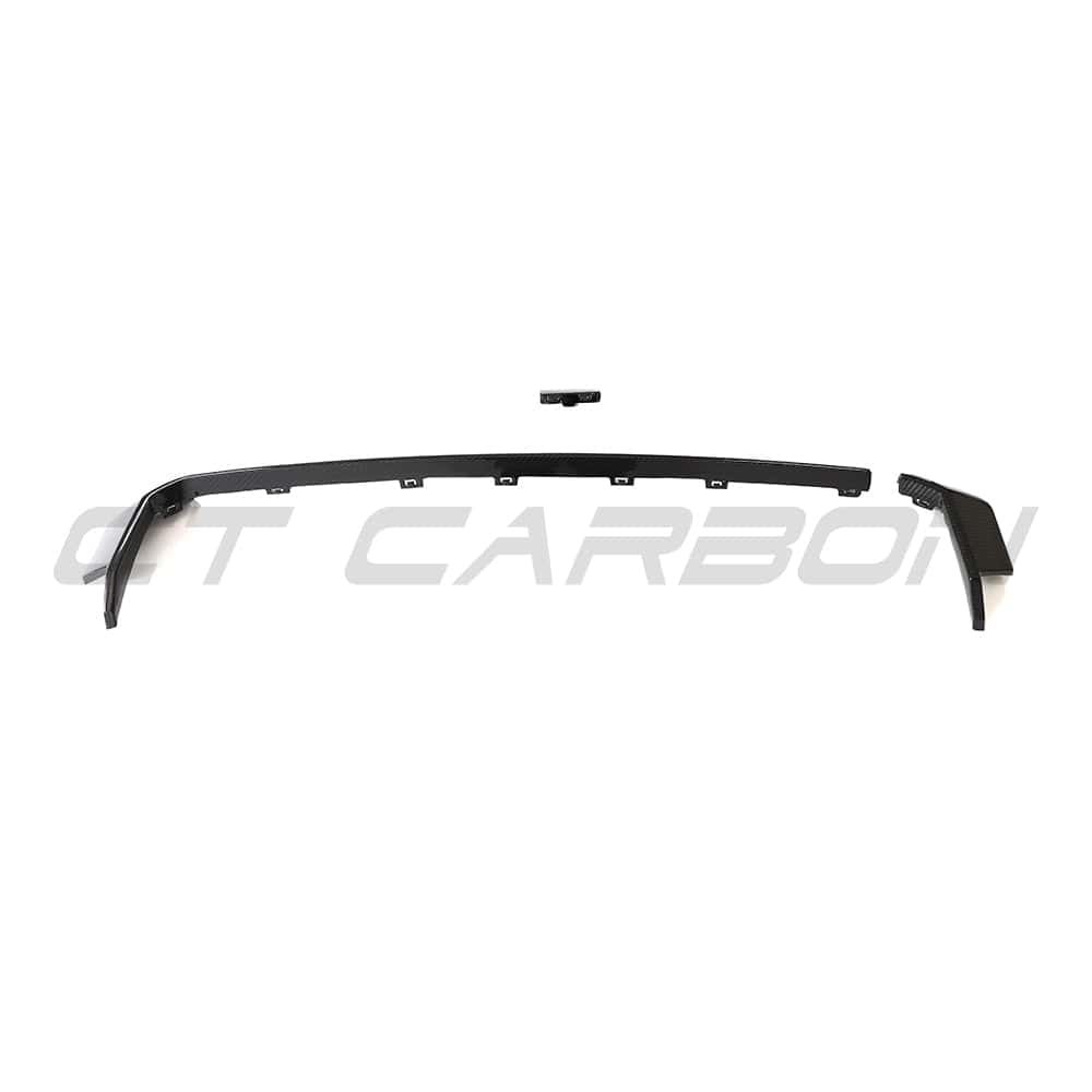 BMW M3 and M4 G80 G81 G82 G83 carbon fiber diffuser trim accessory by CT Carbon, shown on a sleek vehicle.