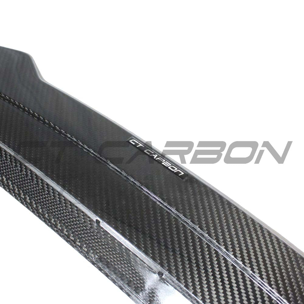 BMW M3 G80 G20 carbon fiber spoiler by CT Carbon, V2 style, shown on the vehicle's rear with a sleek, aerodynamic design.
