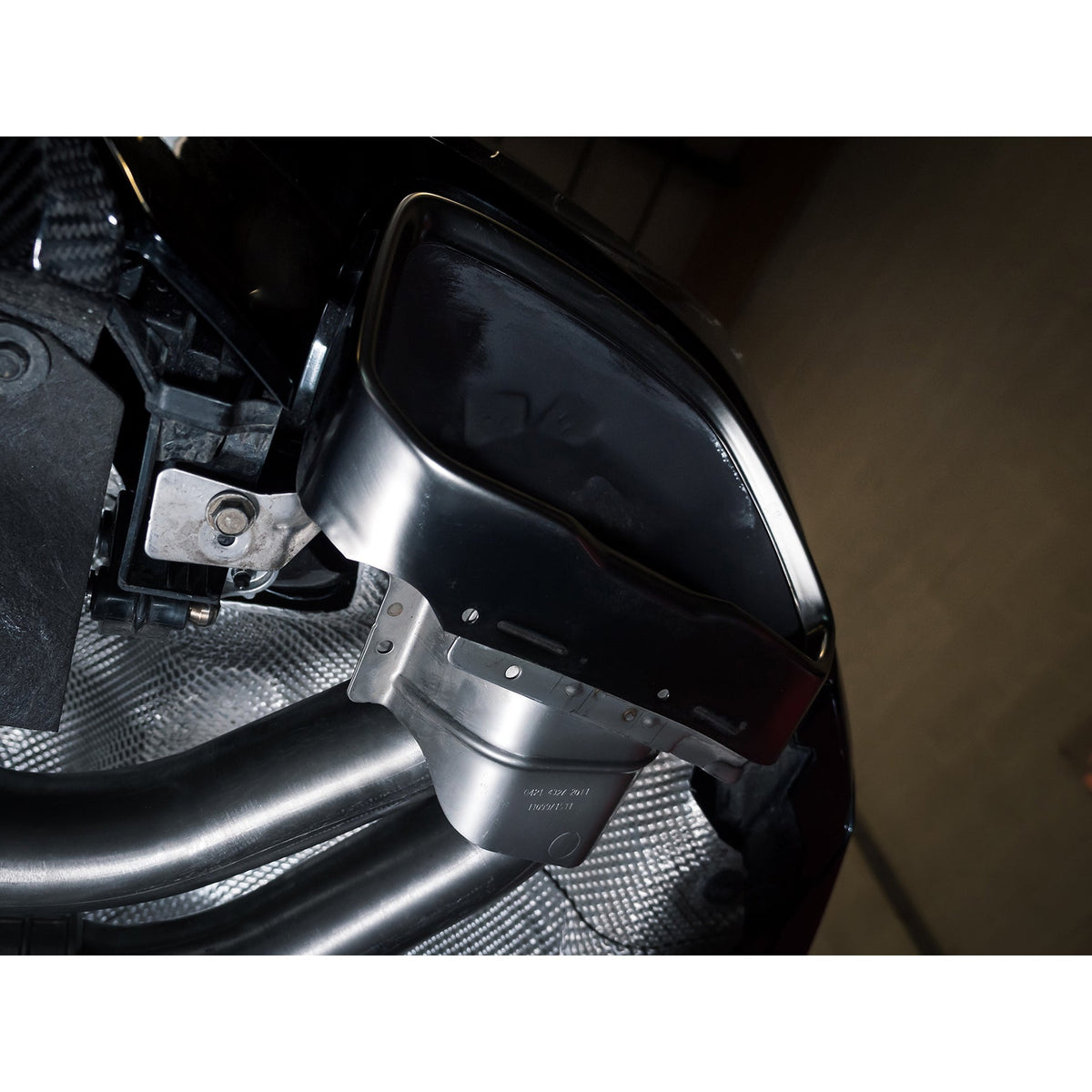 Cobra Sport GPF/OPF back exhaust system installed on BMW M340i G20, featuring valved performance tailpipes for enhanced sound.