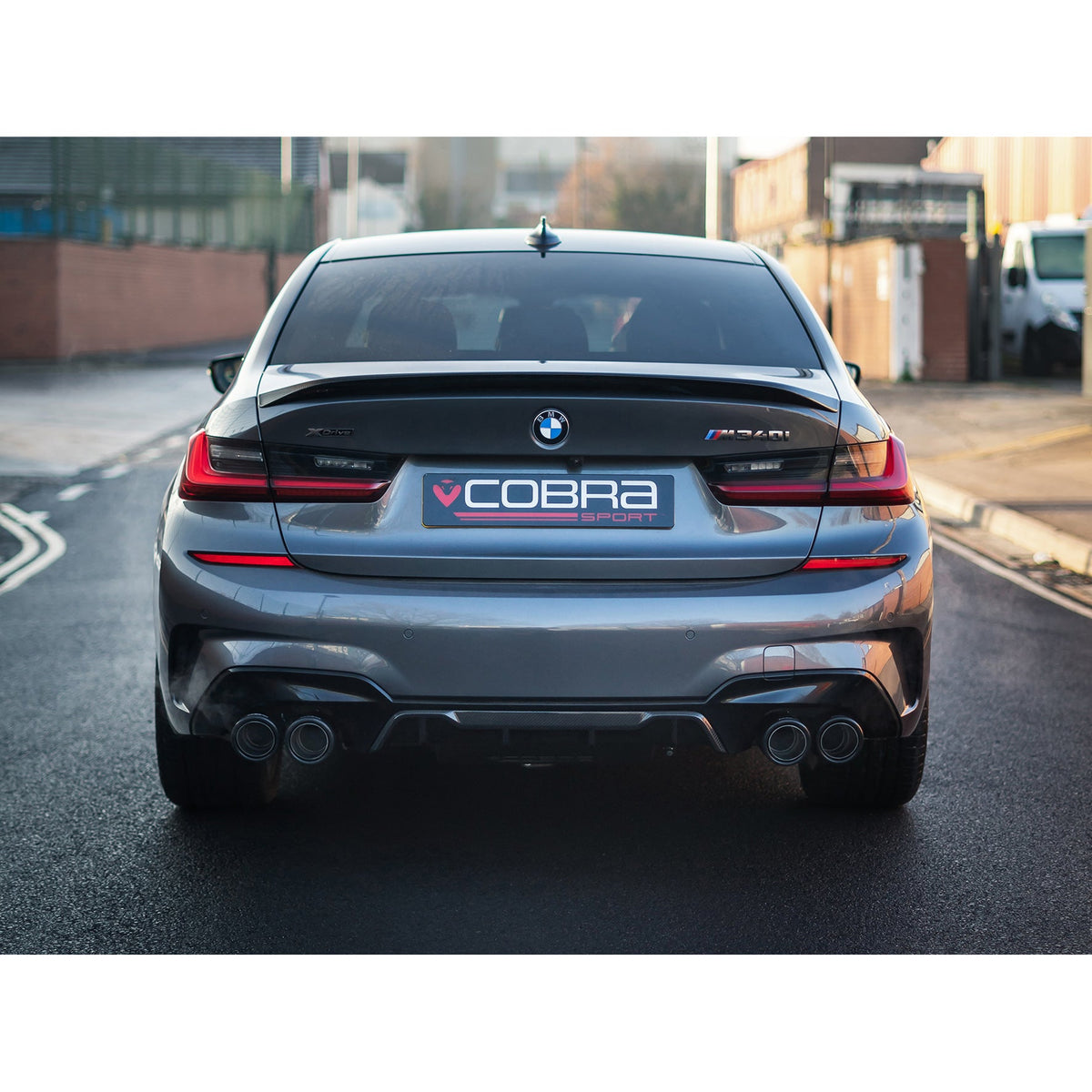 Cobra Sport GPF/OPF back exhaust installed on a BMW M340i G20, showcasing quad exit performance exhaust system.