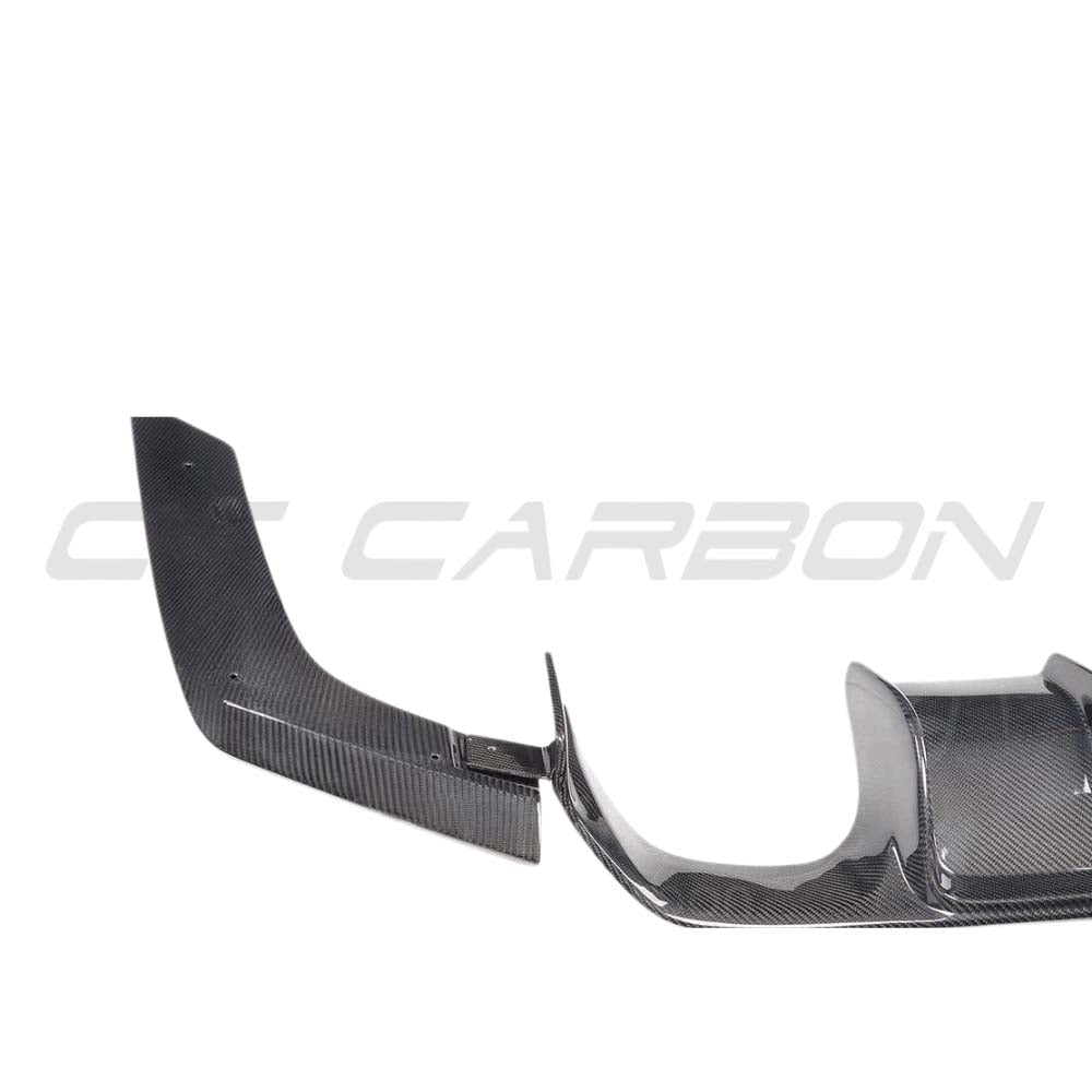 BMW M3 F80 saloon full carbon fibre kit by CT Carbon, featuring diffuser in V-style design, displayed on the car.