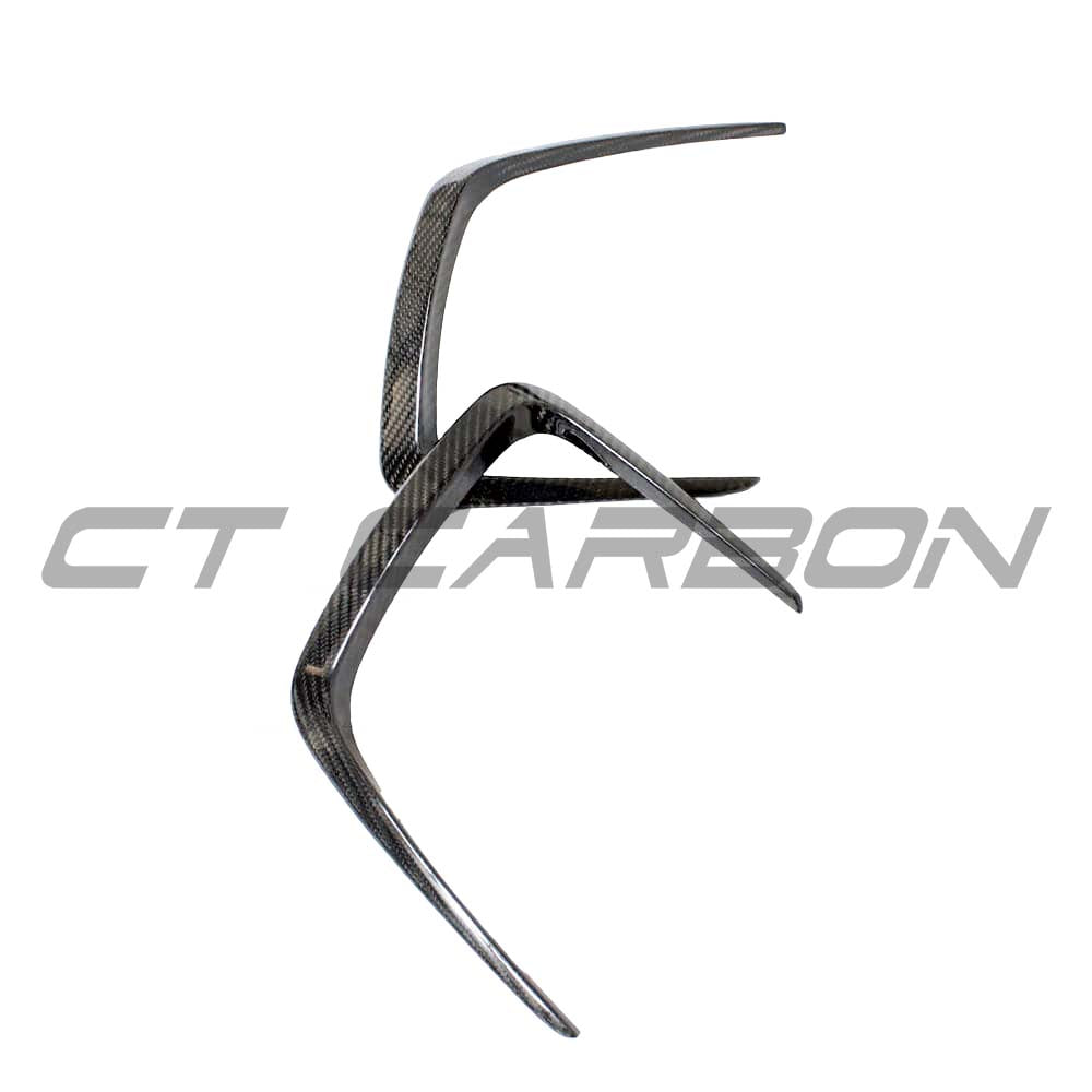 BMW M3 M4 G80 G81 G82 G83 carbon fiber bonnet hood trims by CT Carbon, close-up of sleek, textured automotive accessories.