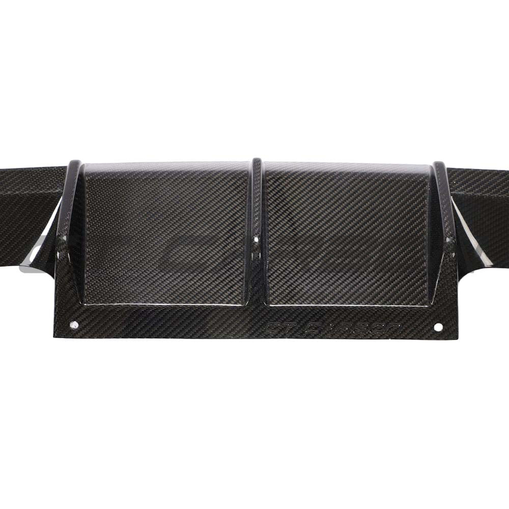 BMW G82 M4 full carbon fibre kit by CT Carbon, showing the diffuser and aerodynamic enhancements on the car.