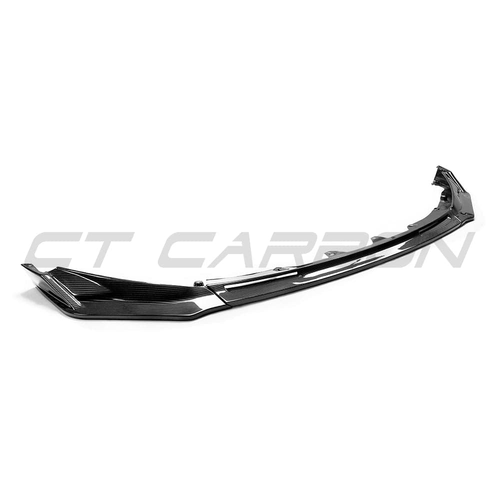 BMW M3/M4 G80 G82 carbon fiber front end kit by CT Carbon, featuring aerodynamic design and advanced accessories.