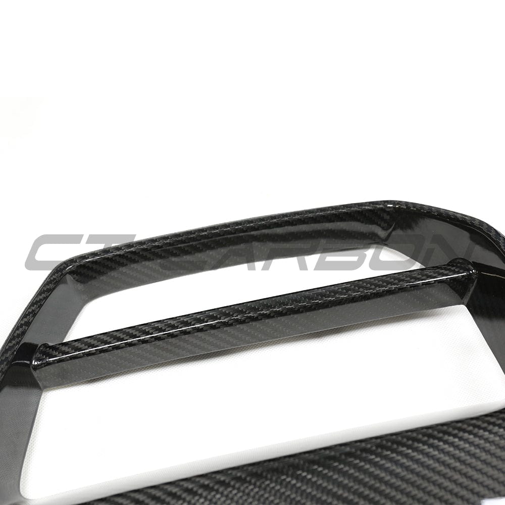 BMW M3 M4 G80 G81 G82 G83 carbon fibre grille by CT Carbon, GT-style with ACC, showcasing sleek, lightweight design.