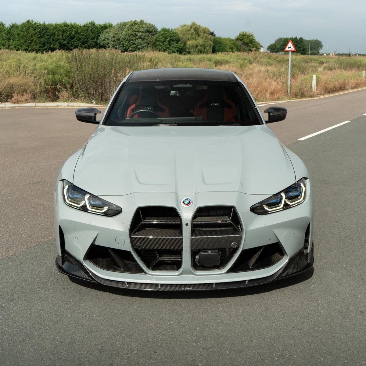 BMW M3 M4 G80 G81 G82 G83 carbon fibre splitter by CT Carbon, featuring a sleek, aerodynamic design with precise fitment.