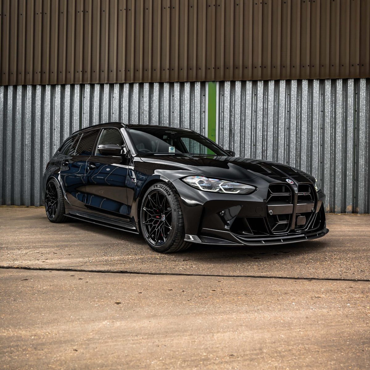 BMW M3 M4 G80 G81 G82 G83 carbon fiber splitter by CT Design, showcasing its sleek, lightweight aerodynamic upgrade.