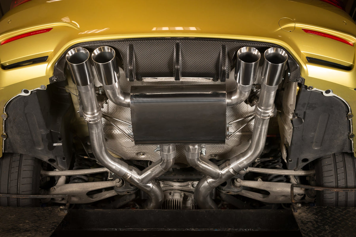 Cobra Sport BMW M3 F80 3-inch valved primary cat back performance exhaust system installed on the car.