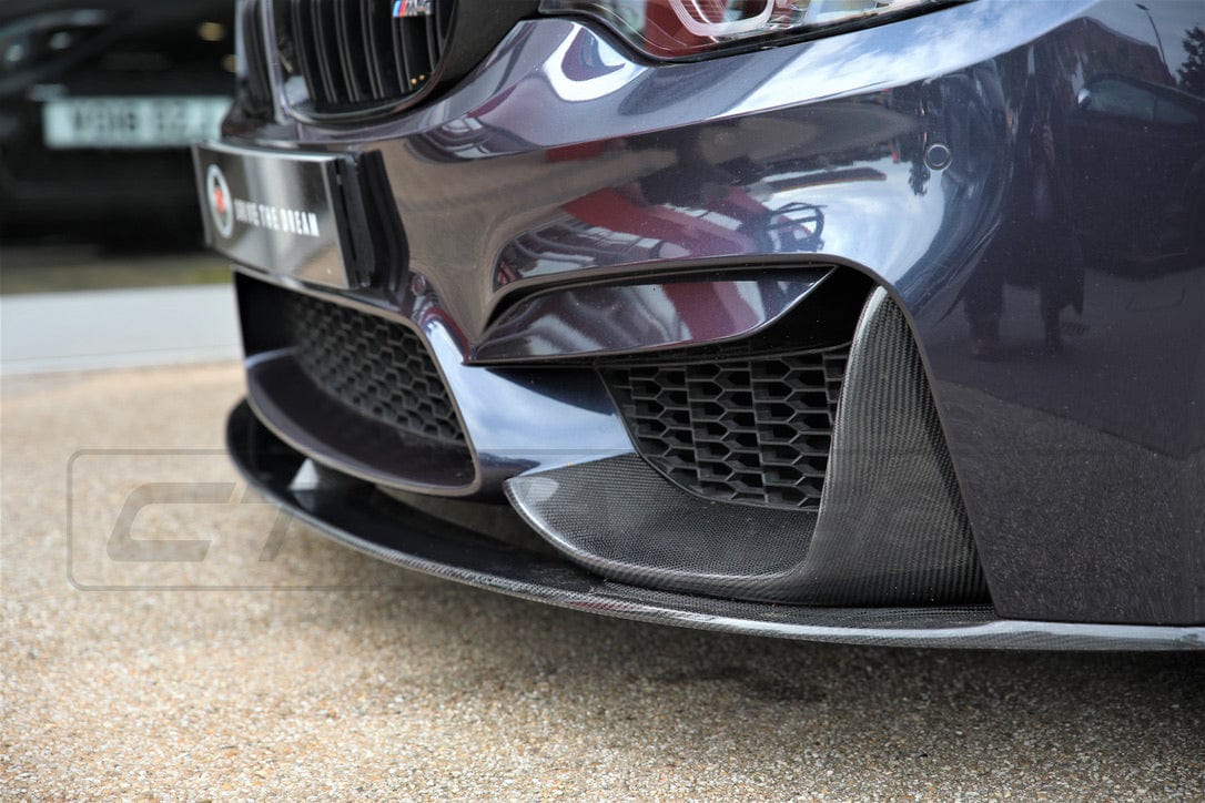 BMW M4 F83 convertible full carbon fibre kit by CT Carbon, showing detailed carbon fiber parts on the car.