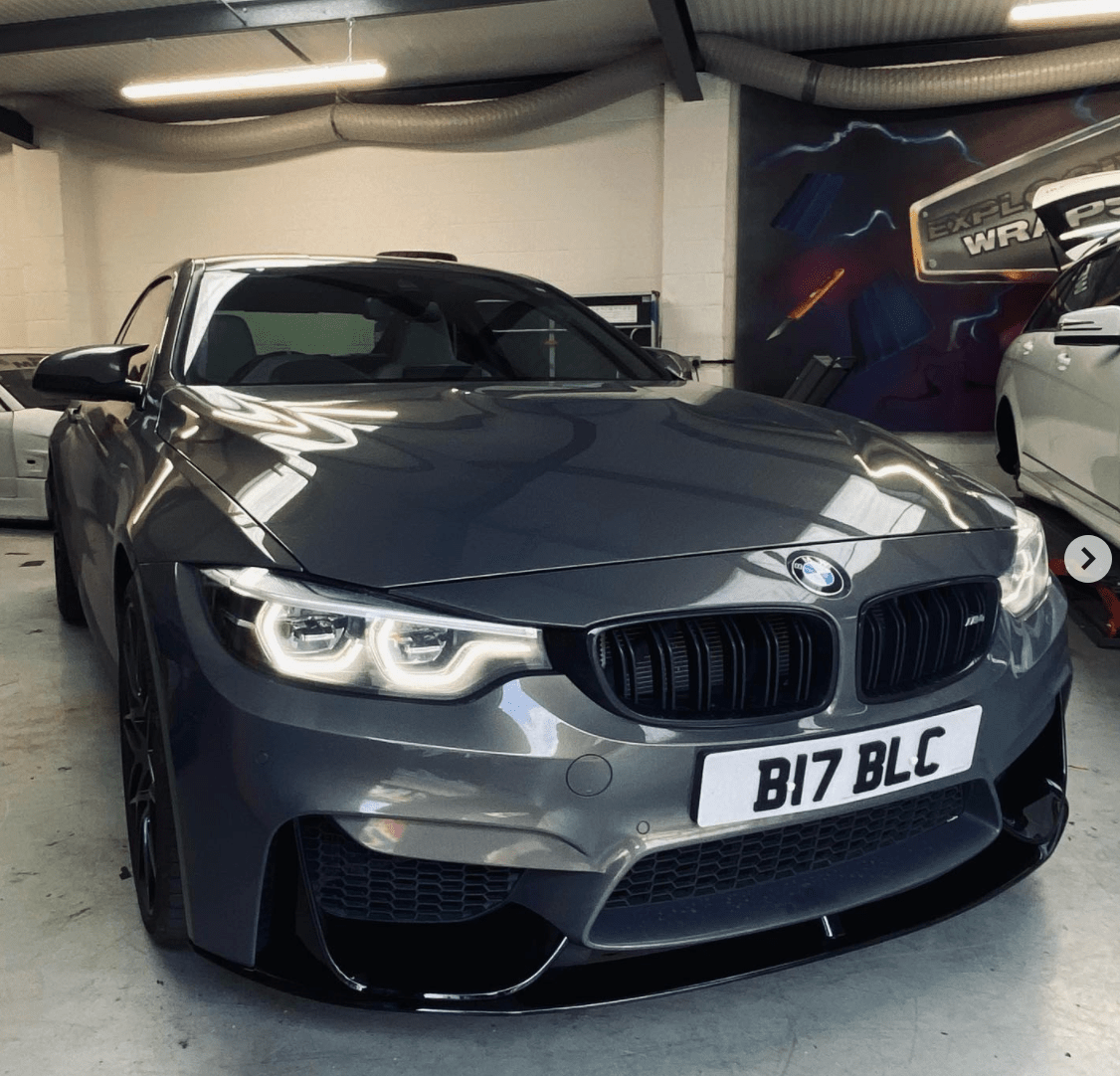 BMW M4 F83 convertible full gloss black kit by CT Carbon, featuring sleek black exterior components and aerodynamic accents.