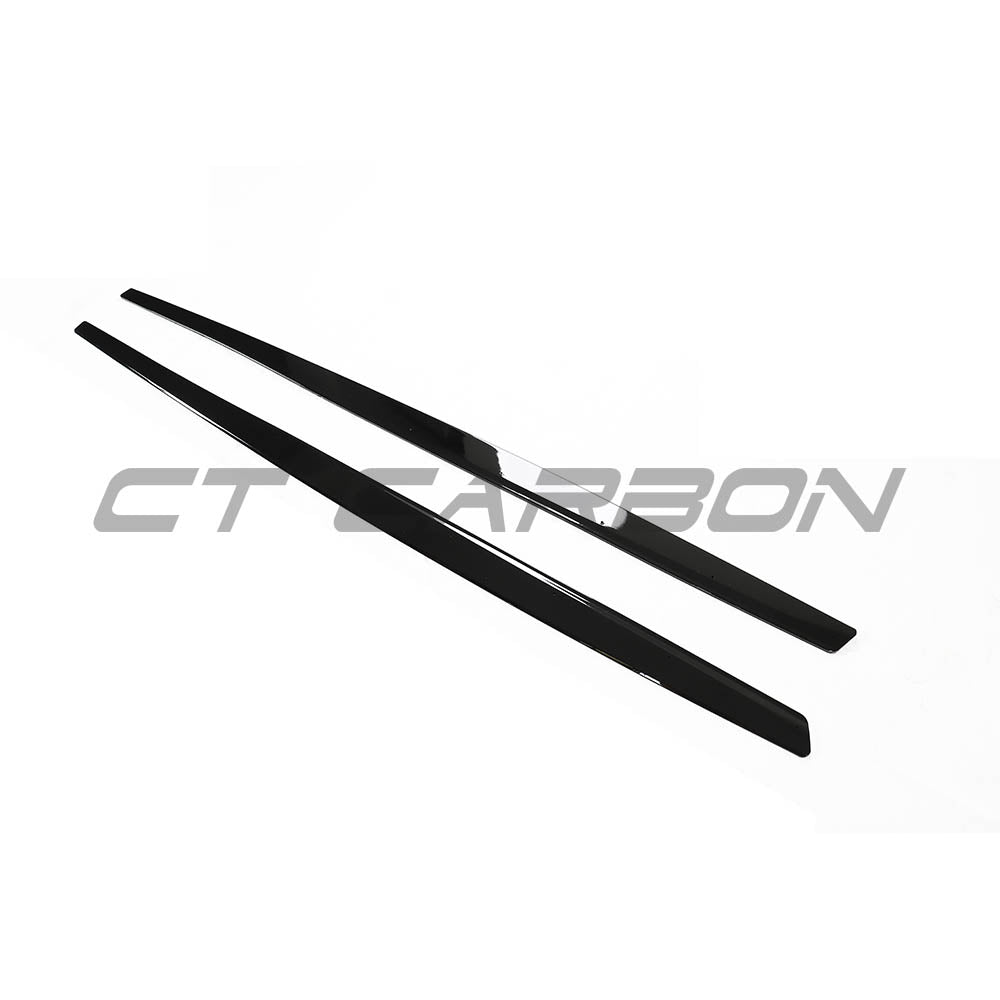 BMW M3 F80 full gloss black kit by CT Carbon, featuring sleek exterior components on a convertible model.